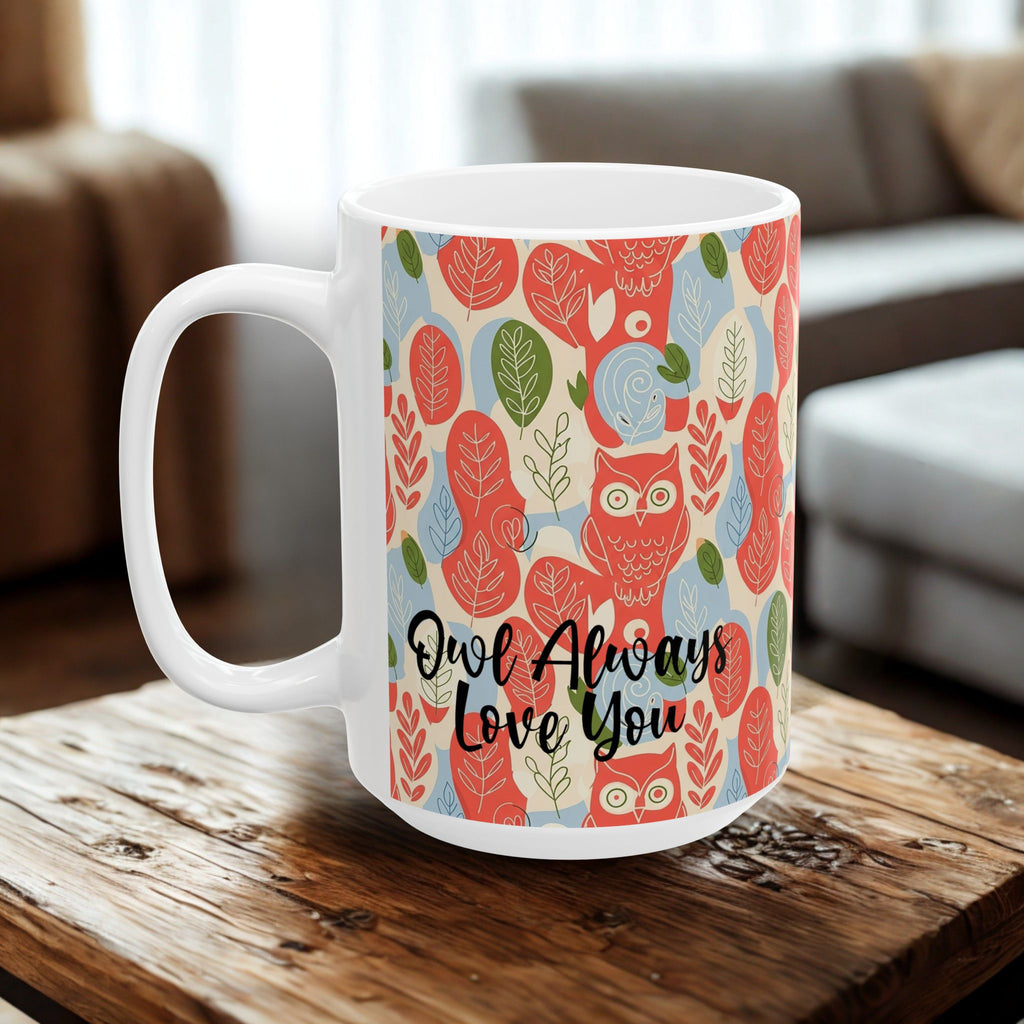 Mug with owl pattern and 'Owl Always Love You' text on a wooden table.