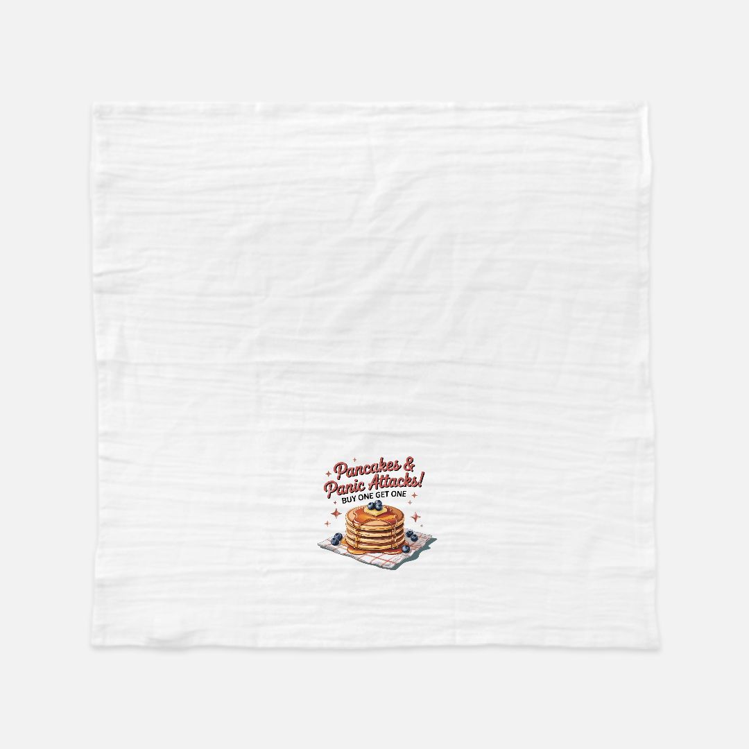 White towel with a stack of pancakes and text design on a white background