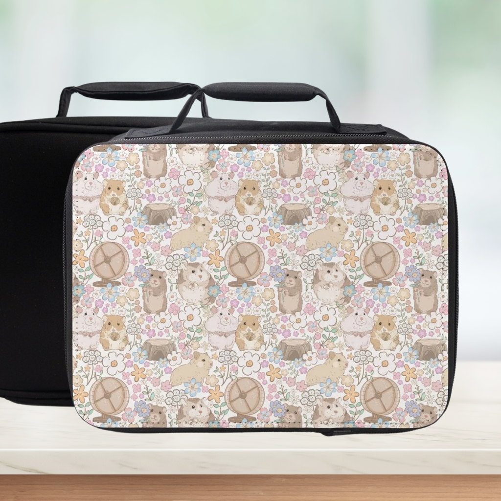 Black lunch bag with a pattern of small hamsters and flowers on a light background