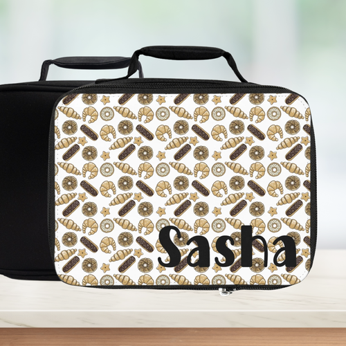 Lunch bag with donut pattern and 'Sasha' text on a white background