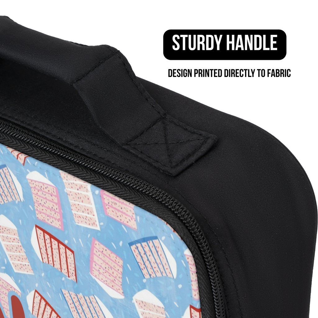 Black lunch bag with a cake patterned design on fabric, featuring a sturdy handle.