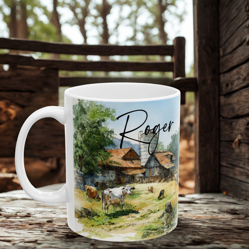 Mug with a scenic farm design of cows and a barn, featuring the name 'Roger', on a wooden surface.