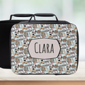  insulated lunch bag with baking-themed pattern and 'CLARA' personalized name on a counter with a light background
