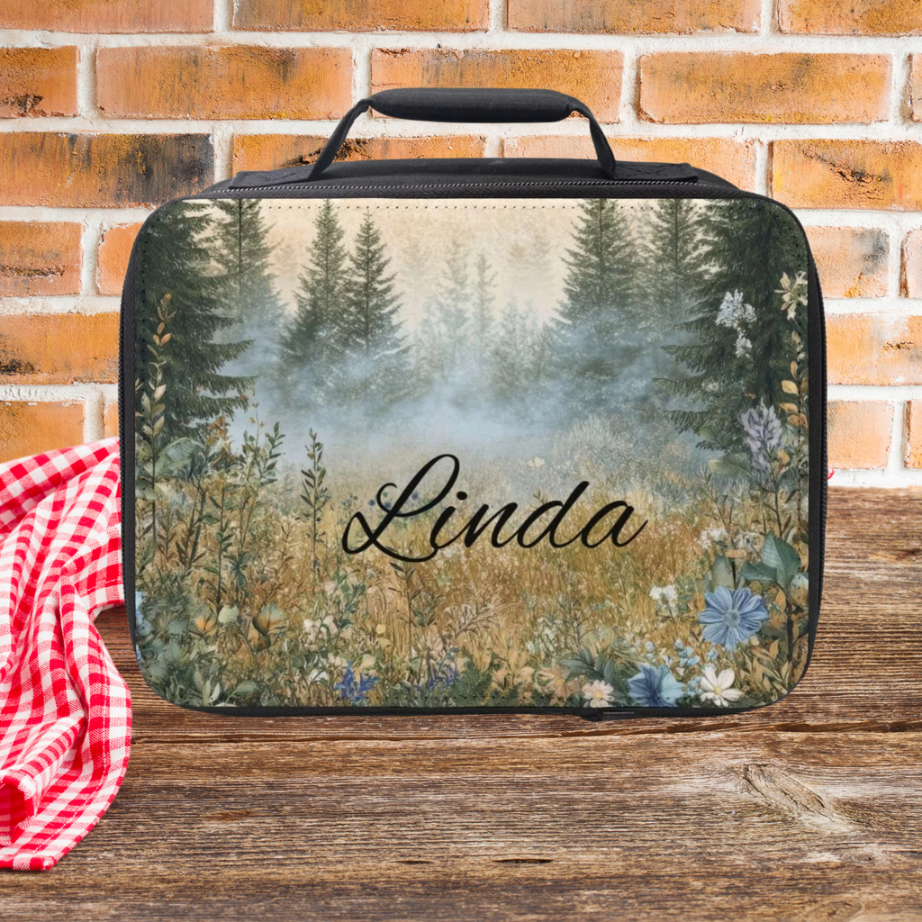 Lunch bag with nature design and 'Linda' text against a brick wall background