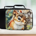  insulated lunch bag with a chipmunk design and 'Chloe' custom text on a counter with a blurred green background
