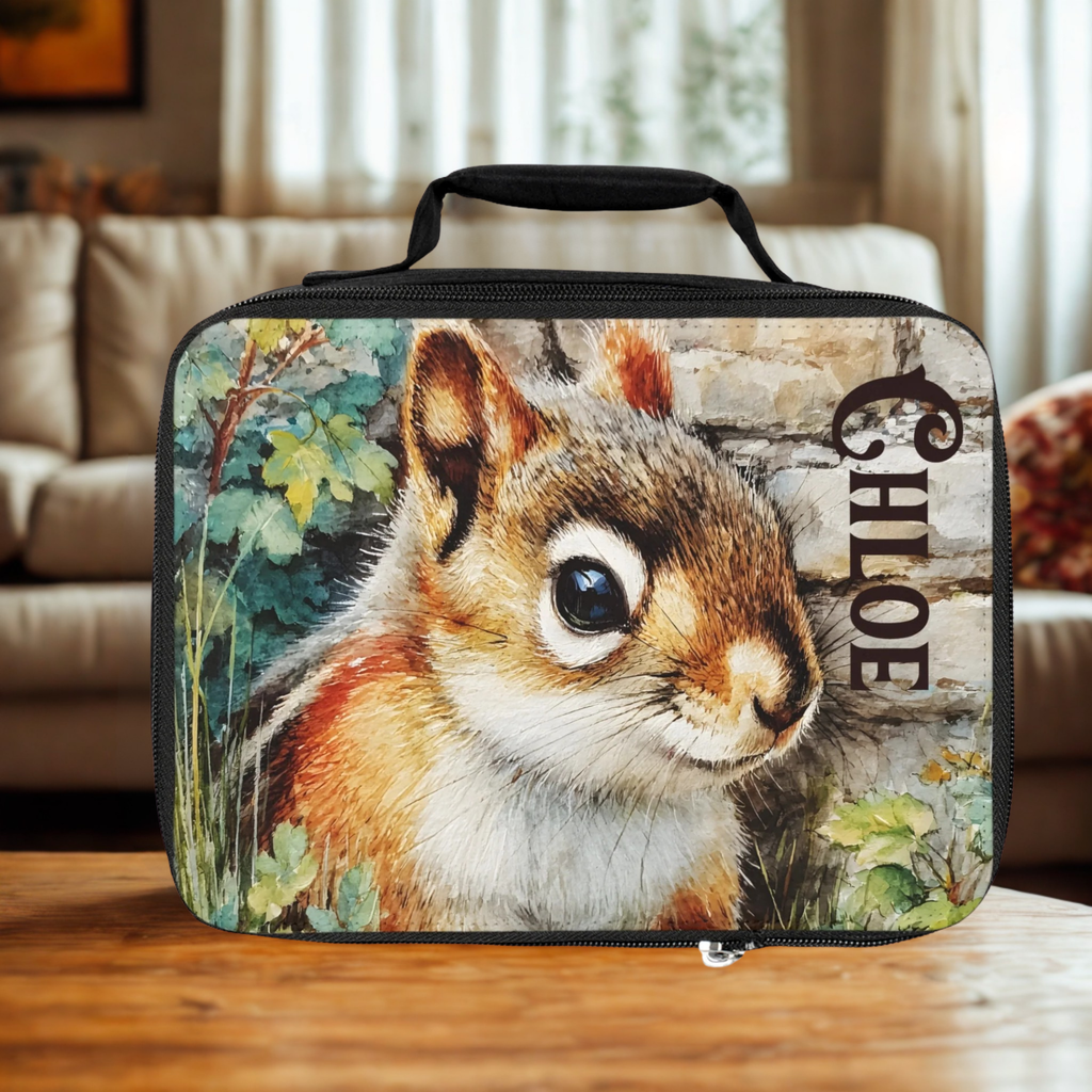  insulated lunch bag with a chipmunk design and 'Chloe' custom text on a wooden living room table.