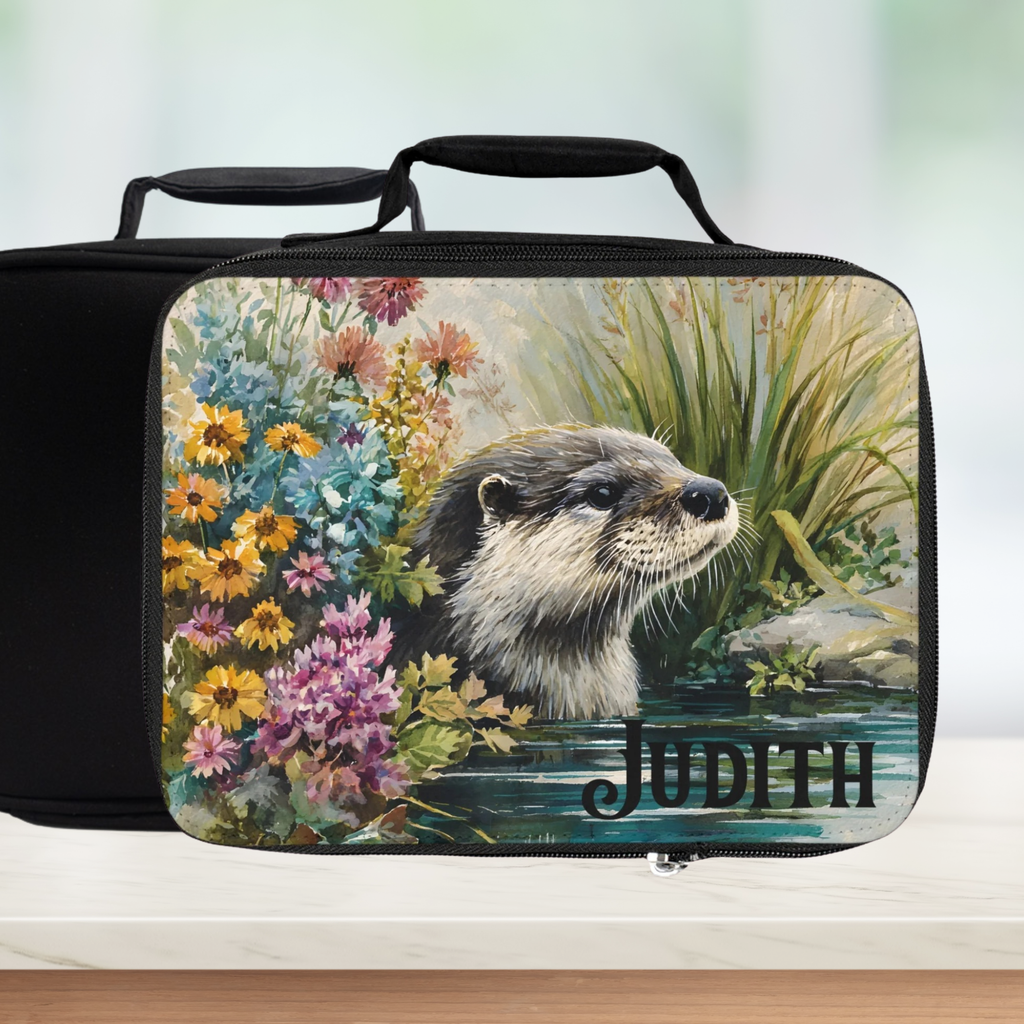 insulated lunch bag with an otter and floral design, personalized with 'Judith'.