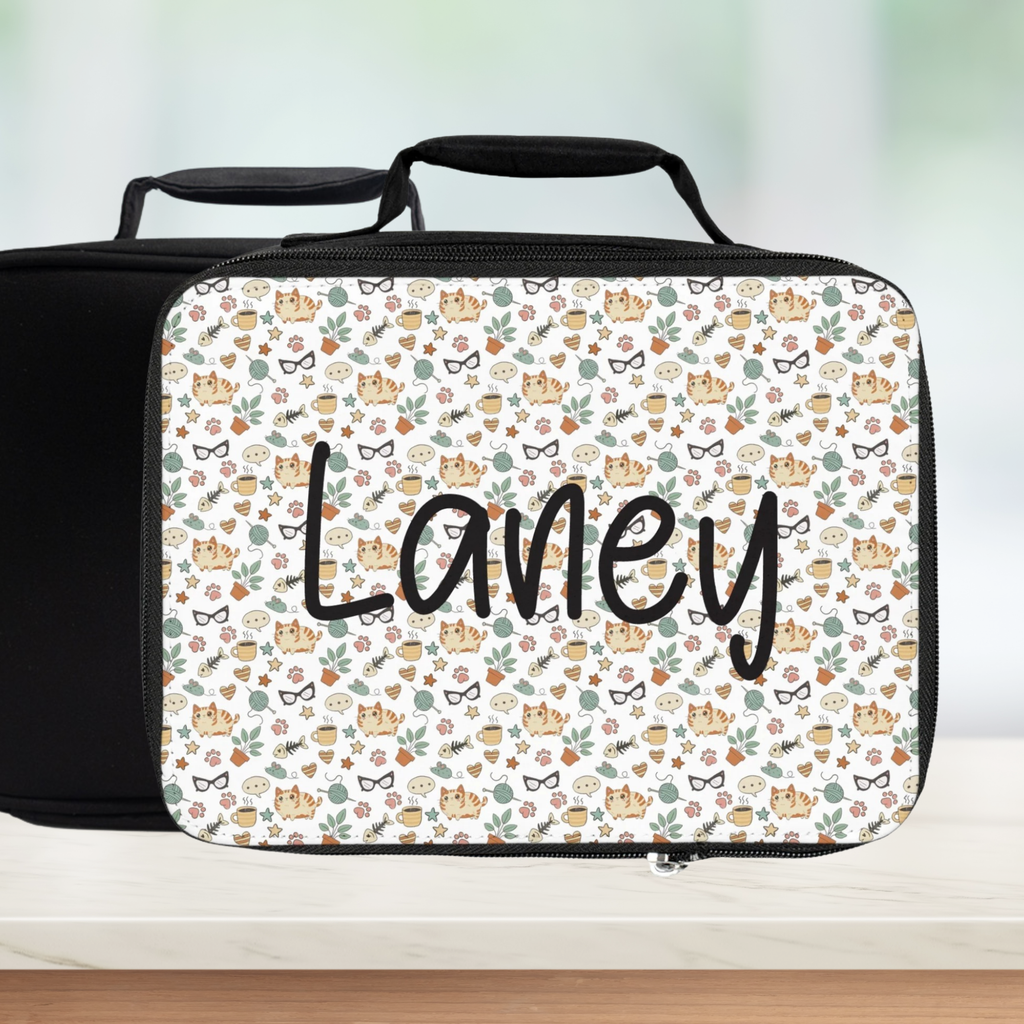 Personalized lunch bag with 'Laney' and animal pattern on a white background