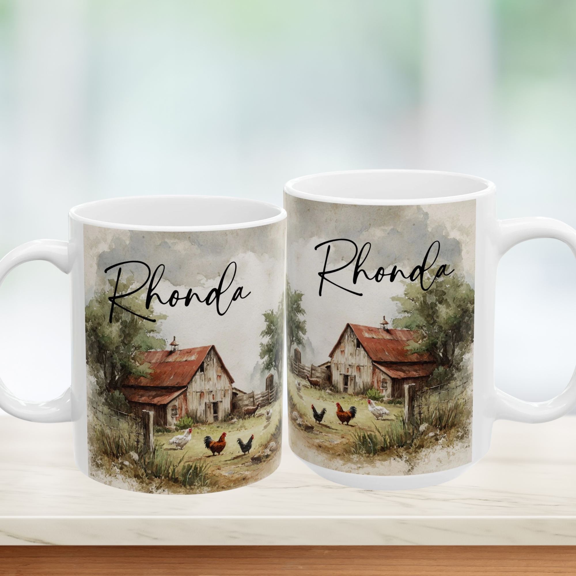 Two mugs with a scenic design of a barn and chickens, featuring the name 'Rhonda'.