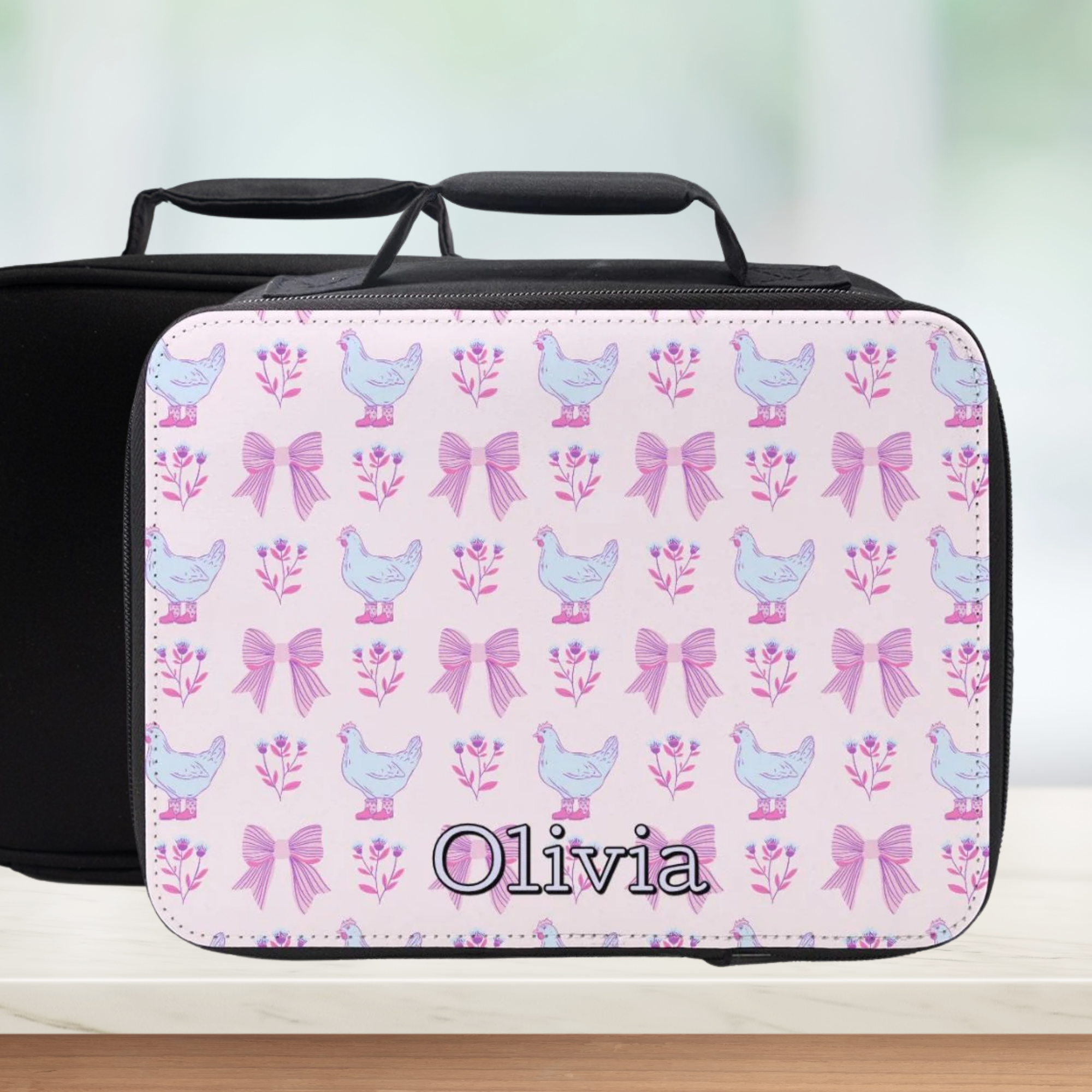 Personalized lunch bag with chicken and bow pattern on a light background