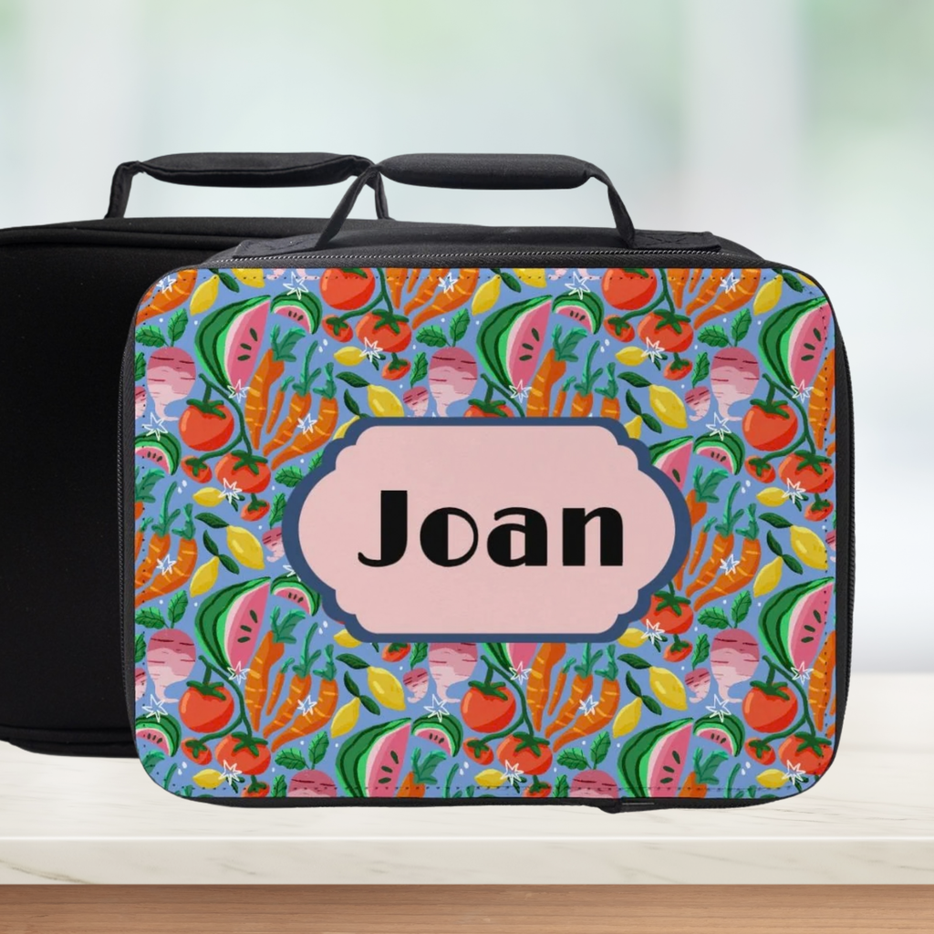 Colorful fruit patterned lunch bag with 'Joan' custom text on a white background