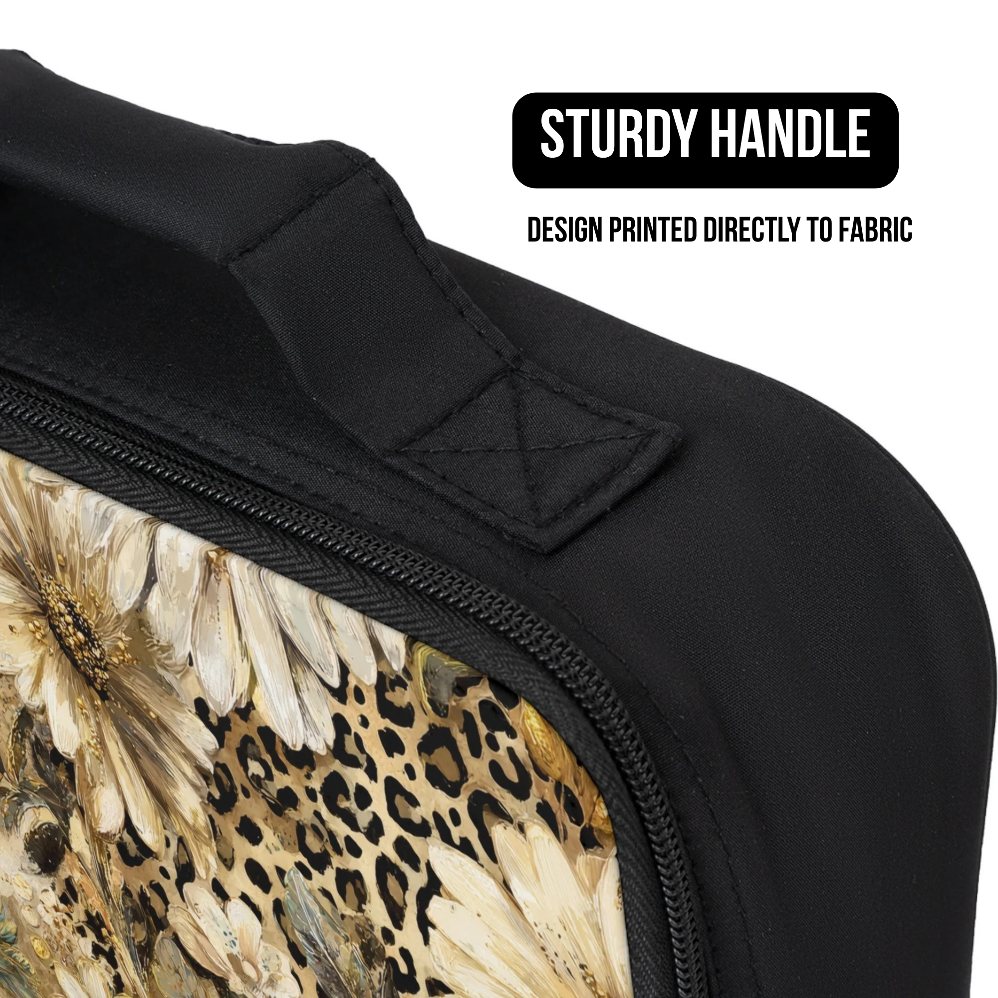 Black bag with floral and leopard print design, featuring a sturdy handle.