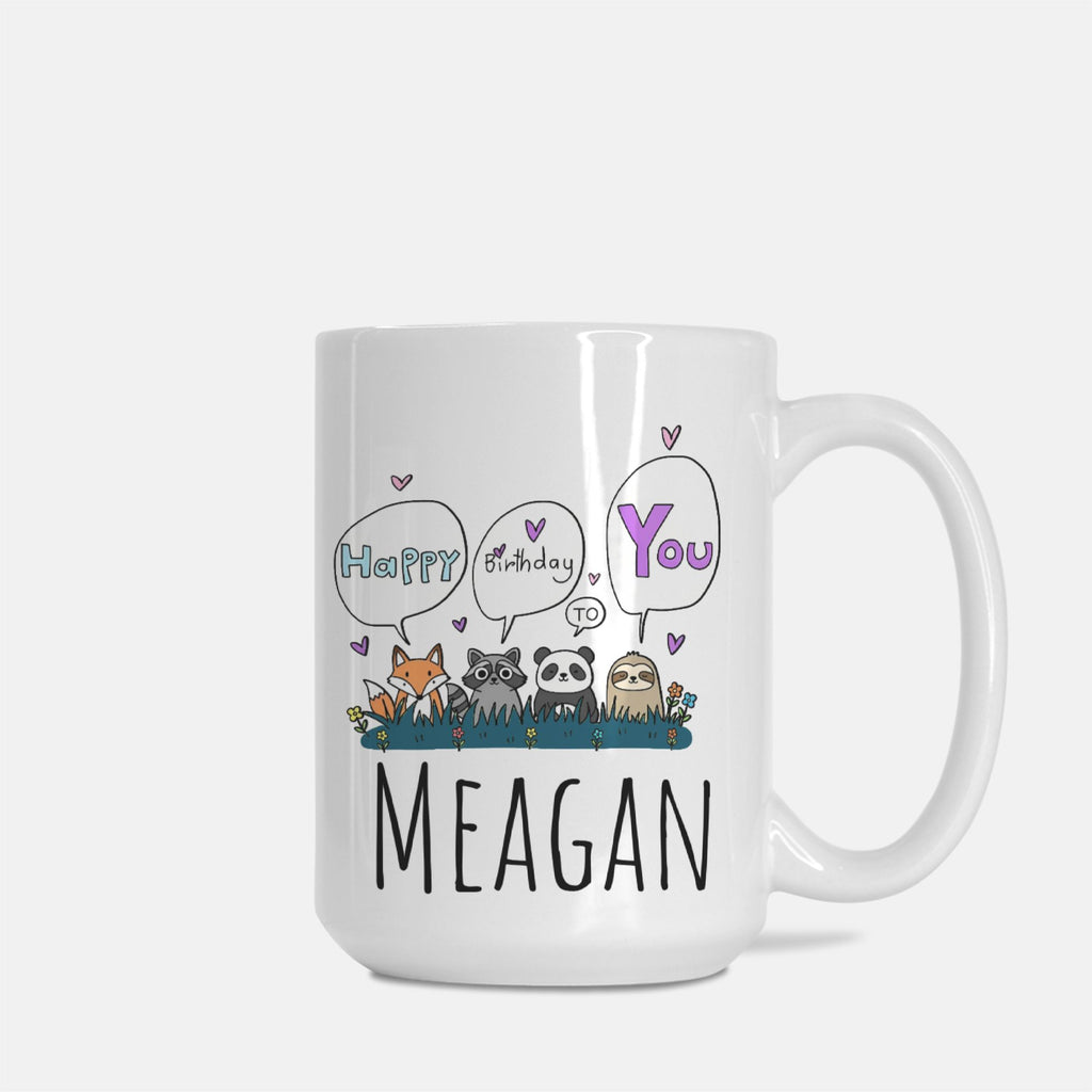 White mug with cartoon animals and personalized text on a white background