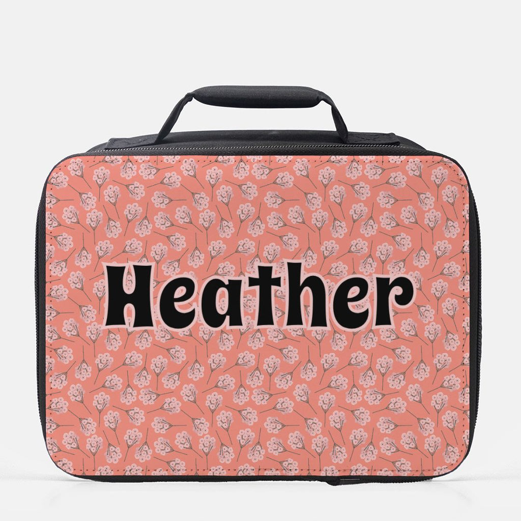 Pink floral patterned lunch bag with personalized name 'Heather'  on a white background