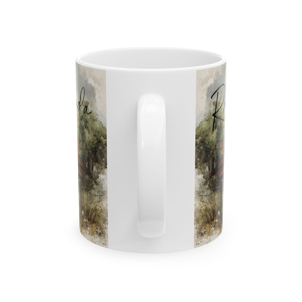 White mug with nature-themed design on a white background