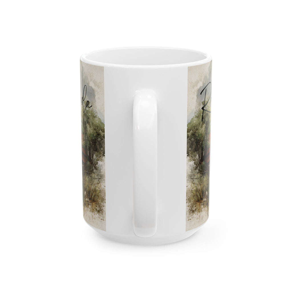White mug with nature-themed design on a white background