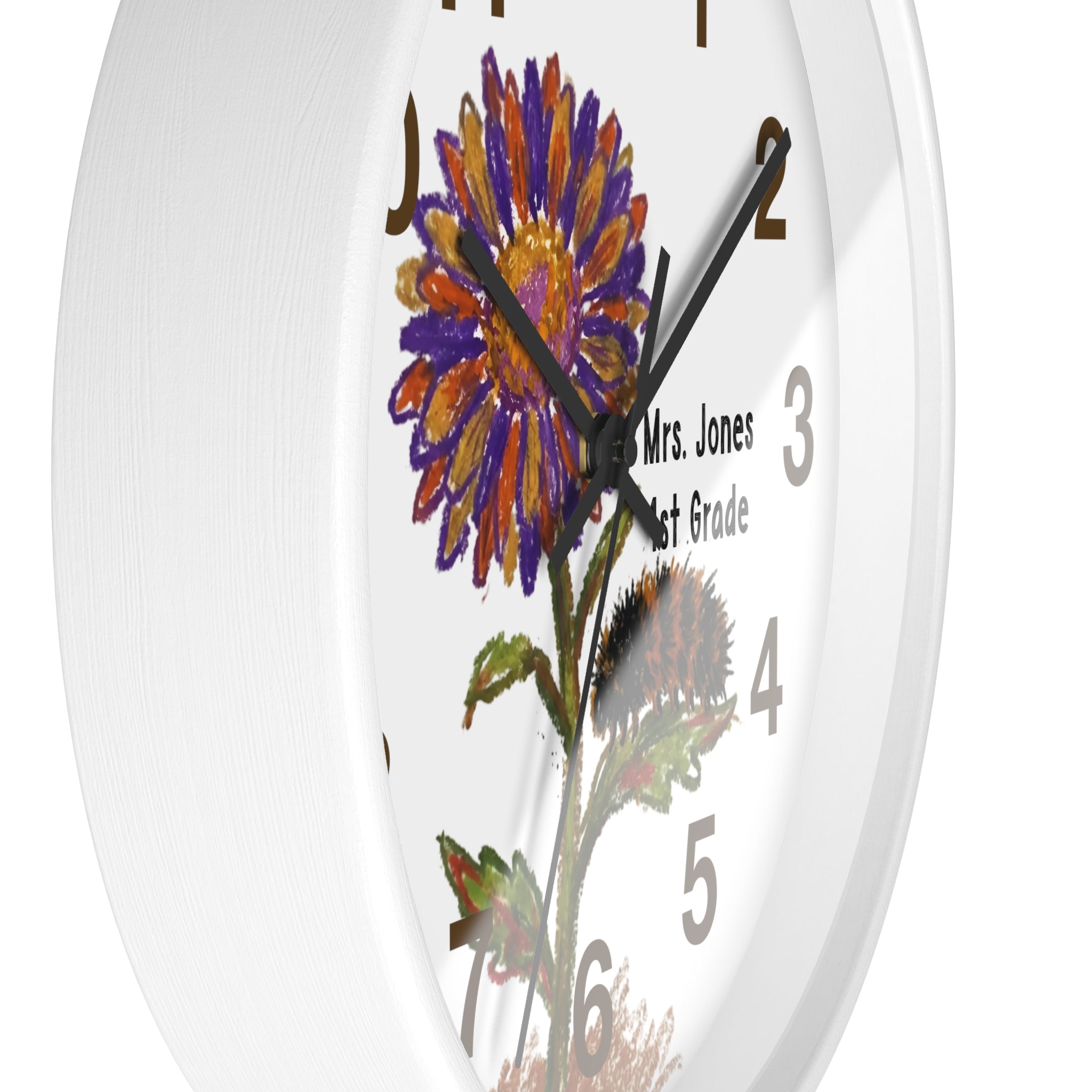 Wall clock with a floral design and text on a white background
