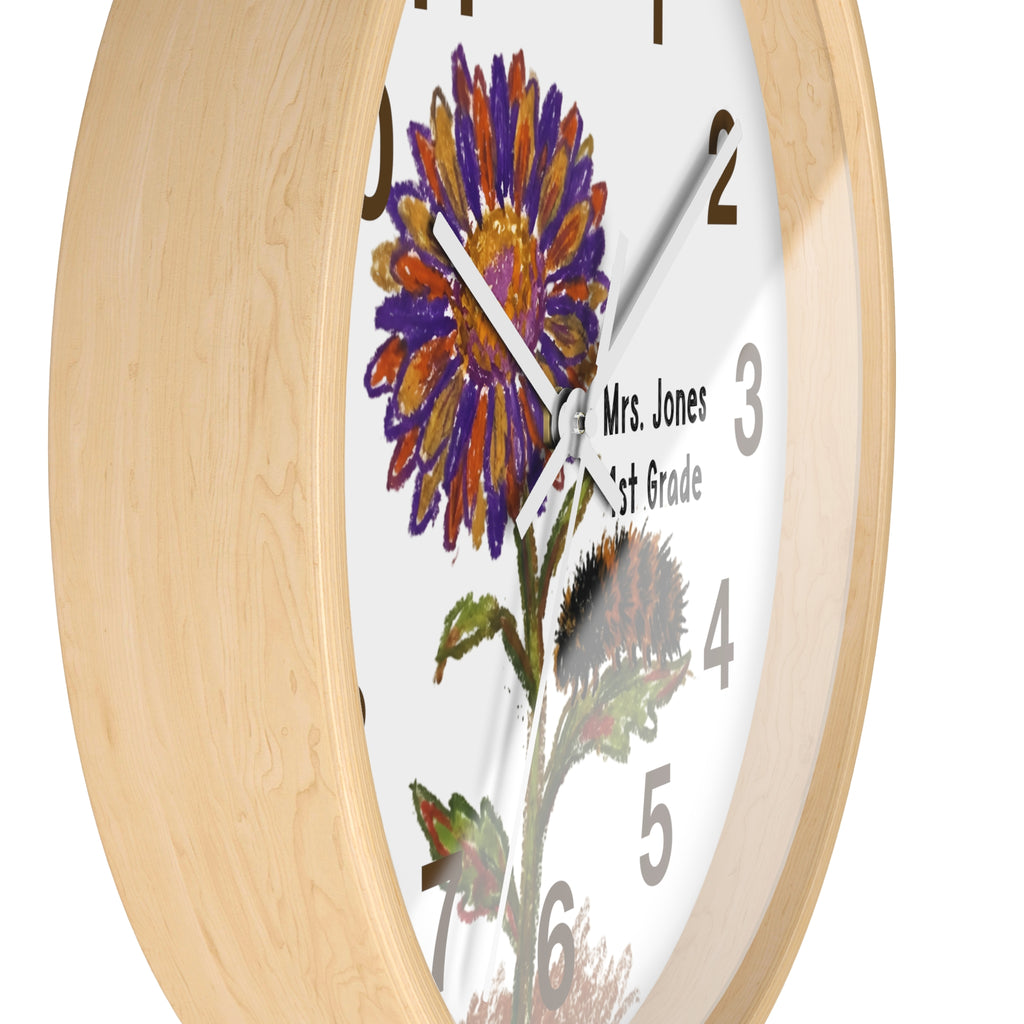 Wall clock with floral design and 'Mrs. Jones 1st Grade' text on a white background