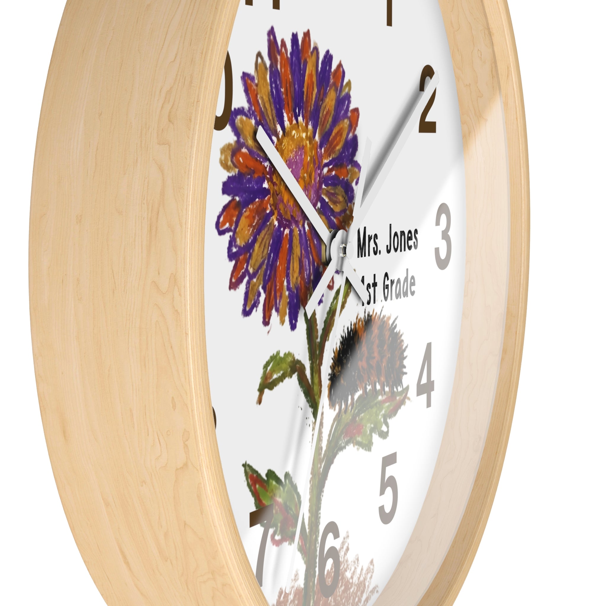 Wall clock with floral design and 'Mrs. Jones 1st Grade' text on a white background