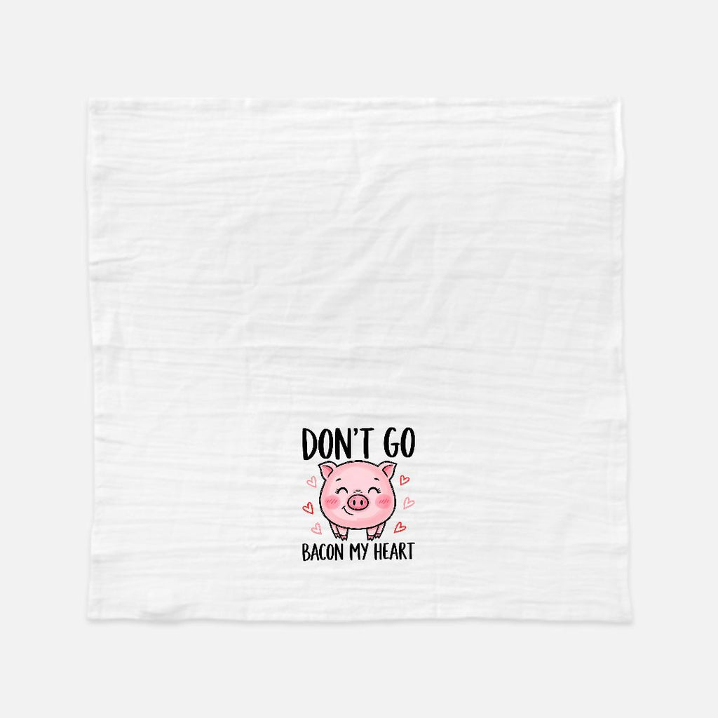 White tea towel with a pink pig graphic and text on a white background