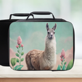 Black lunch bag with a llama and floral design on a light background