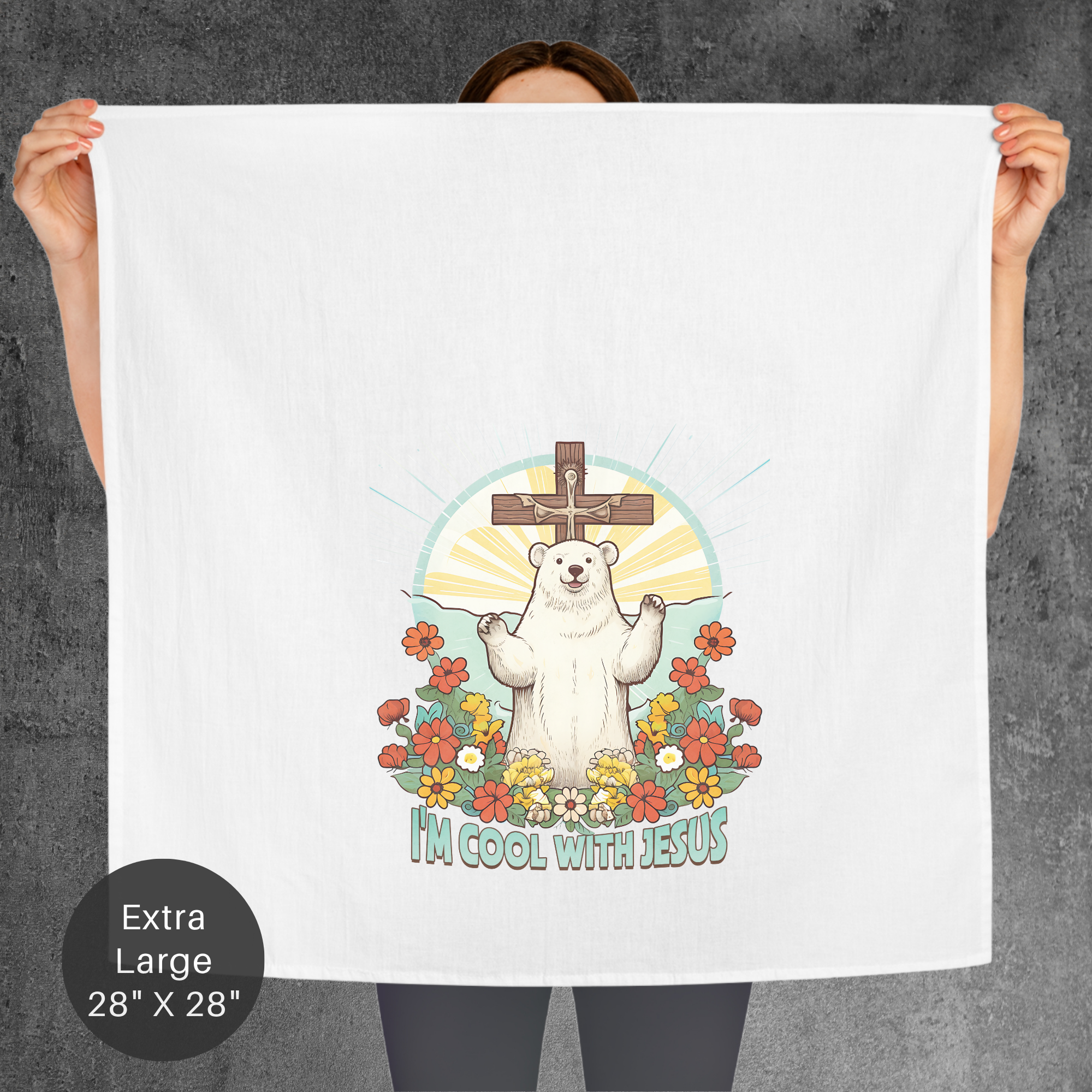 Person holding a towel with a polar bear and cross design, labeled 'I'm cool with Jesus'.