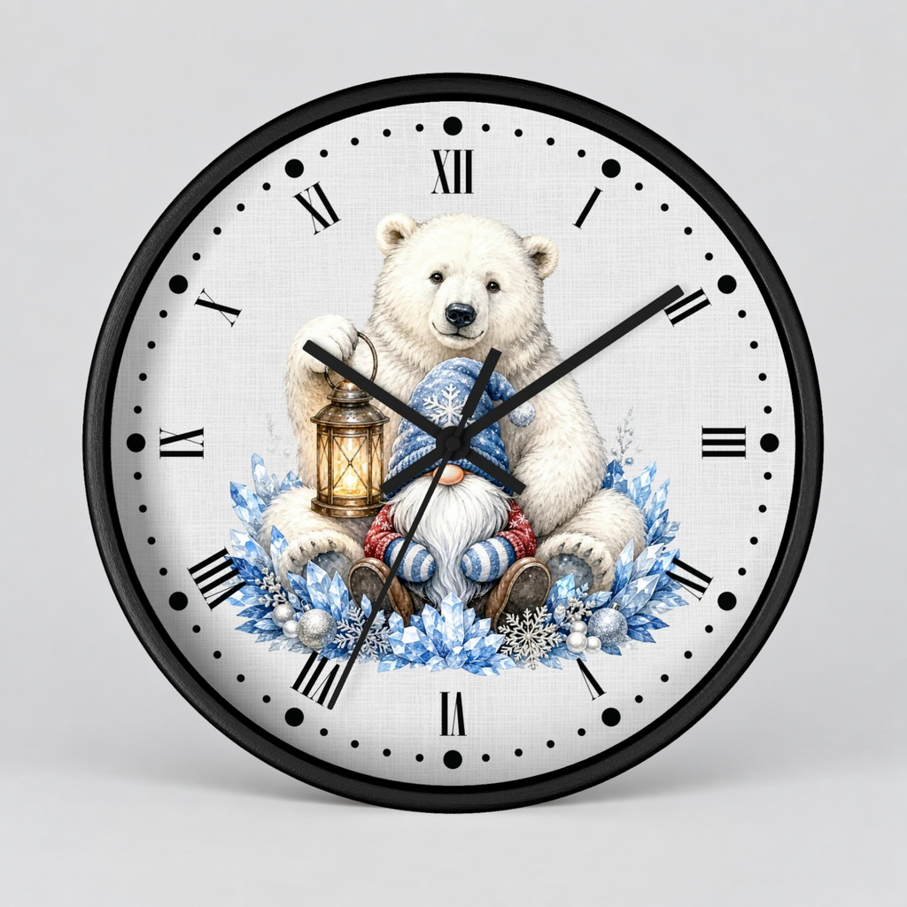 A round wall clock with a black frame and a white face featuring a printed illustration of a polar bear sitting in a sleigh with blue floral accents and a lantern. The clock has black Roman numerals and black hands, photographed against a light gray studio background.