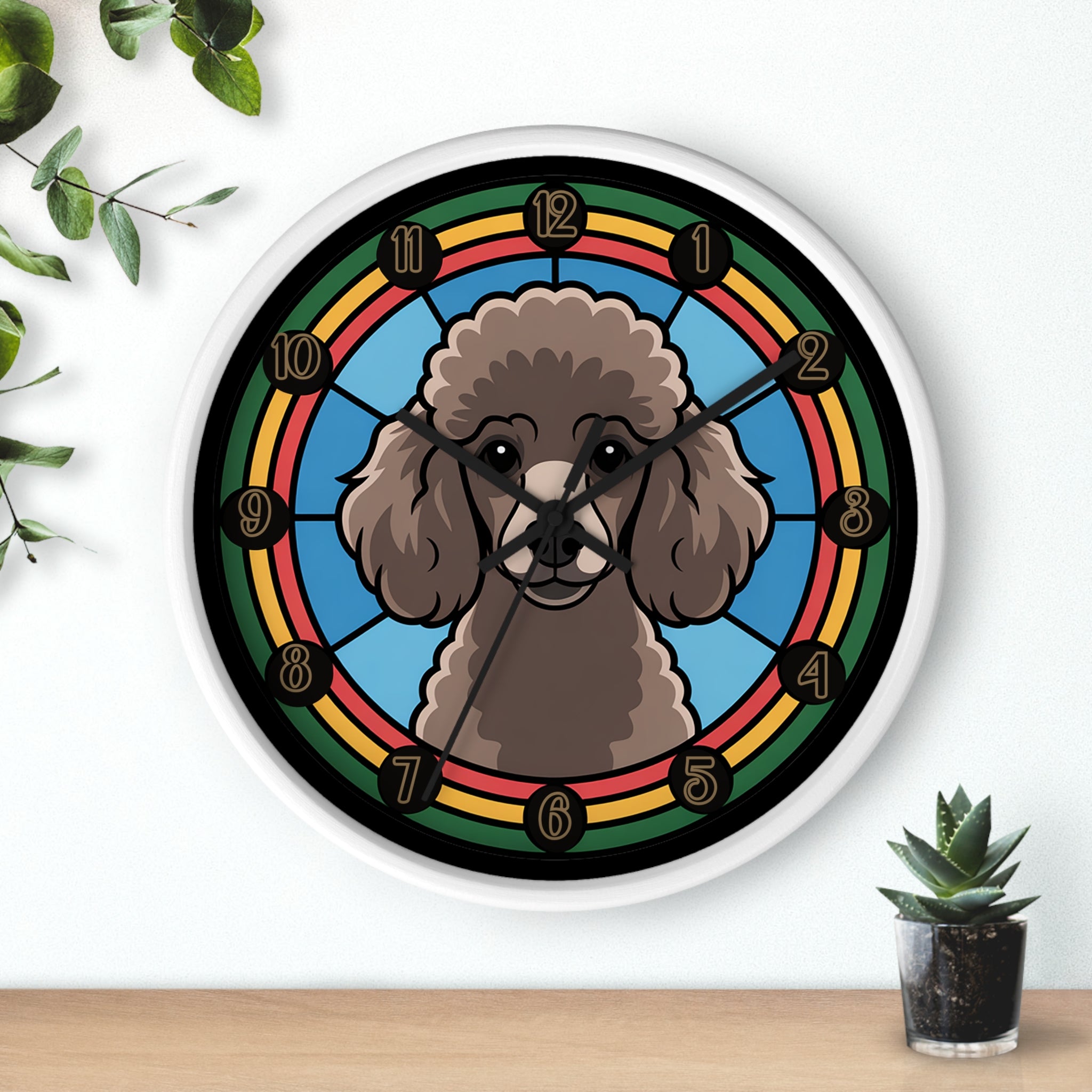White wall clock with a poodle design on a white wall with plants.