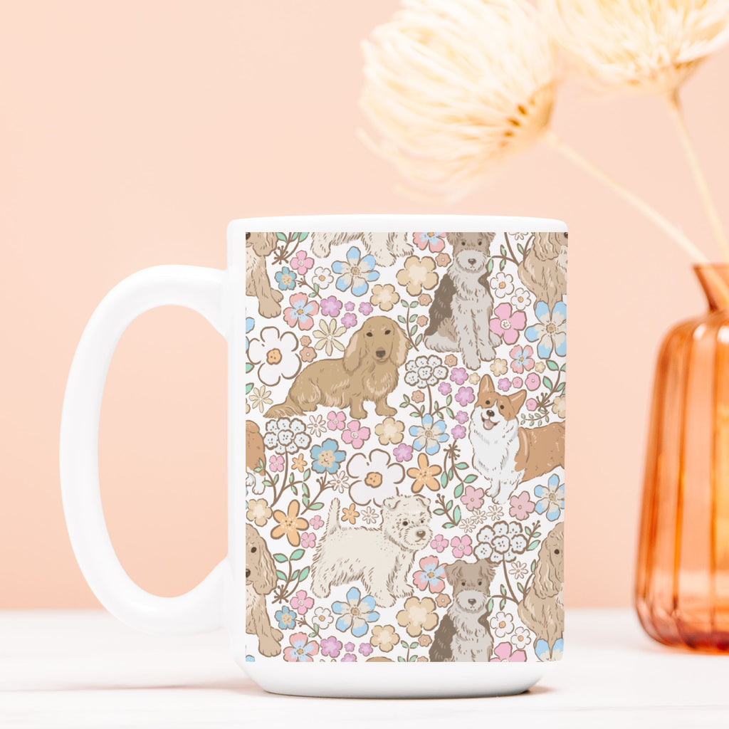 White mug with dog and floral pattern on a light pink background