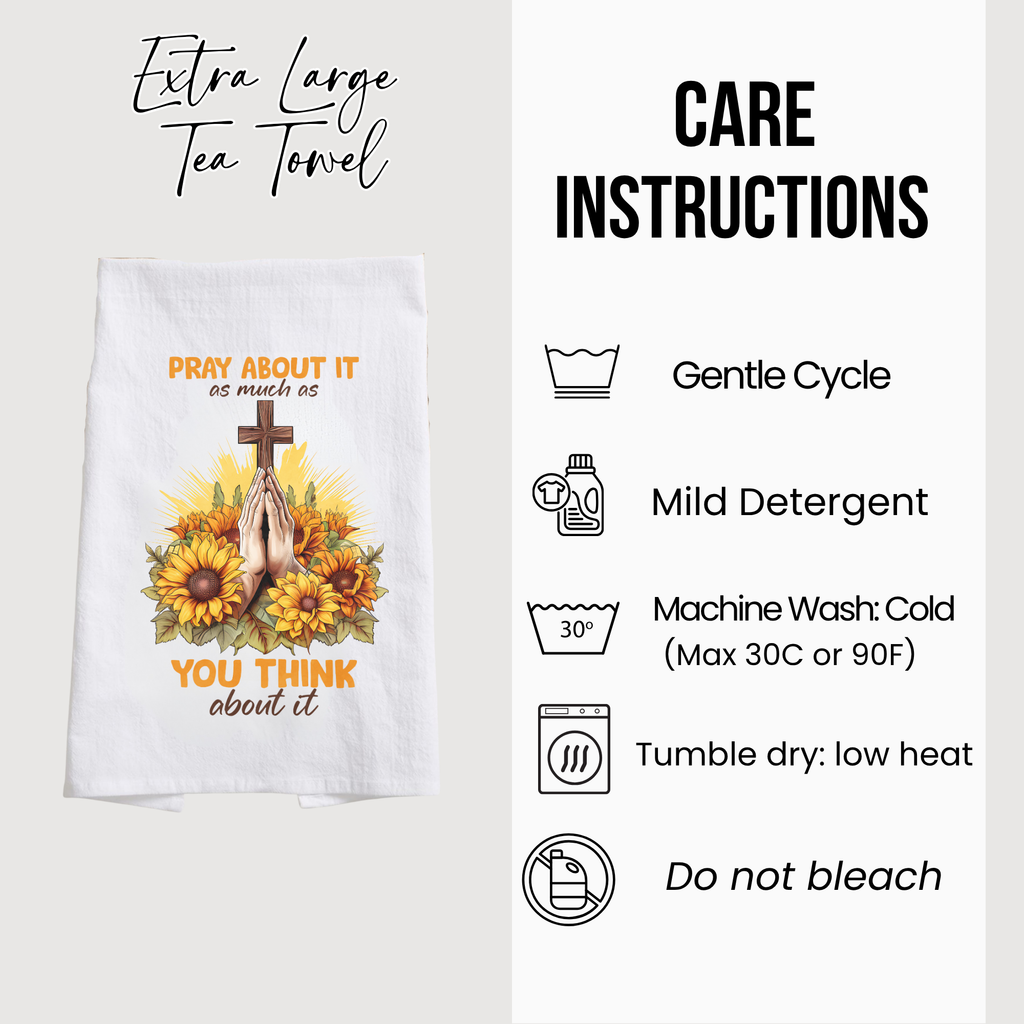 Tea towel with prayer design and care instructions on a white background