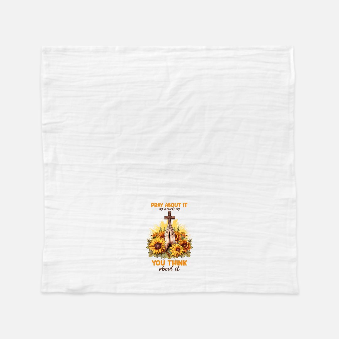 White tea towel with a graphic design featuring a cross, sunflower, and text on a white background