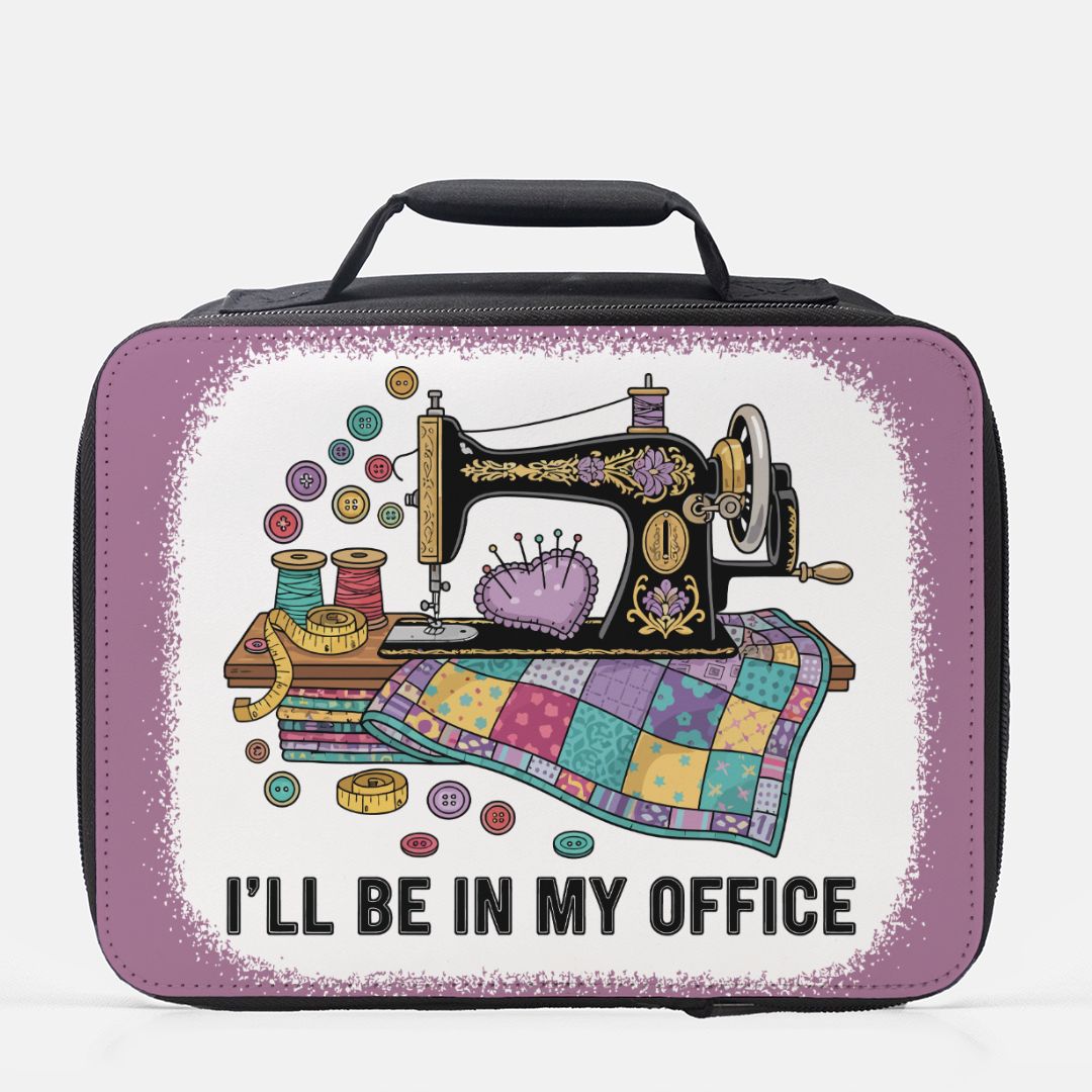 Lunch box with a sewing machine design and text 'I'll be in my office' on a white background