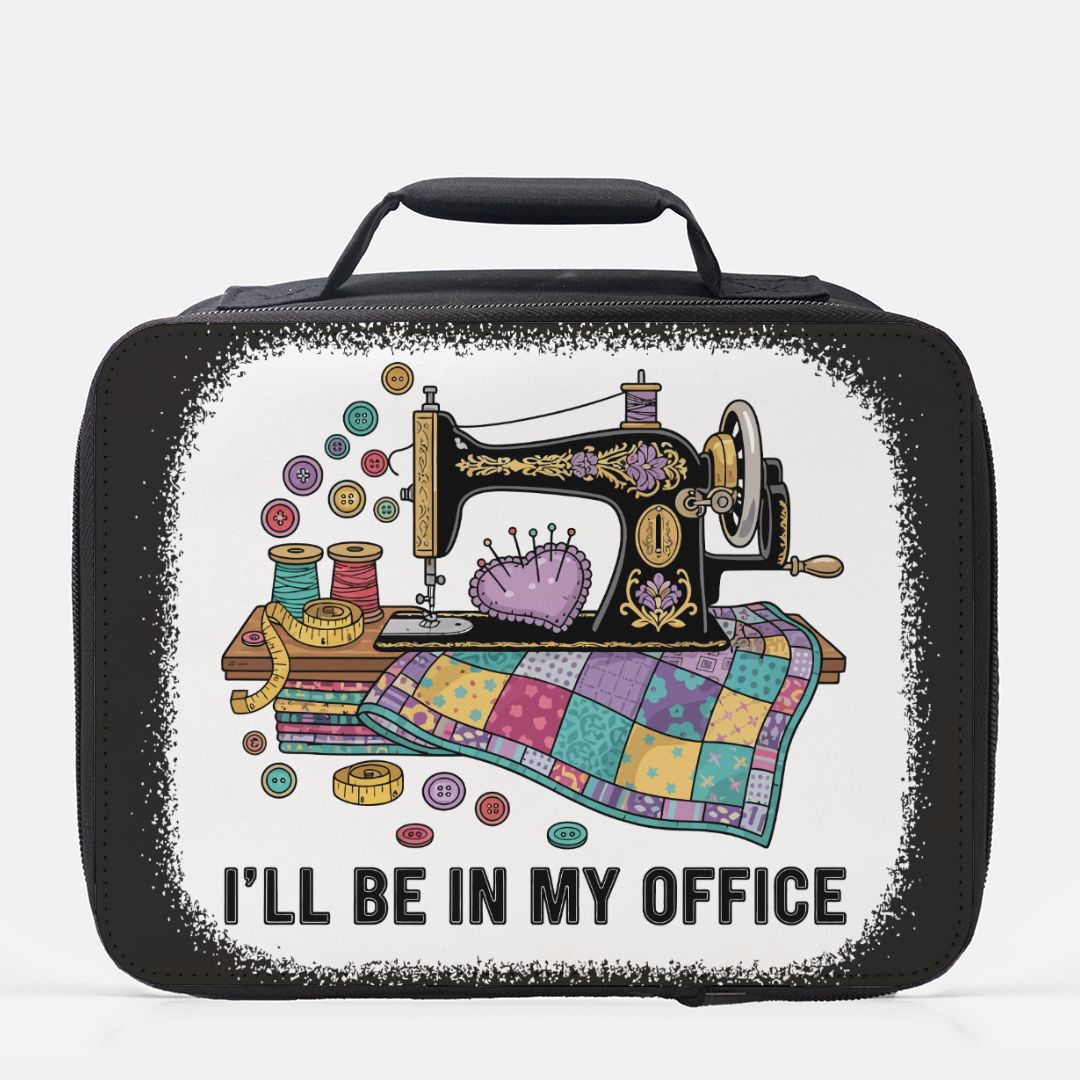 Black lunch bag with sewing machine design and 'I'll be in my office' text on a white background