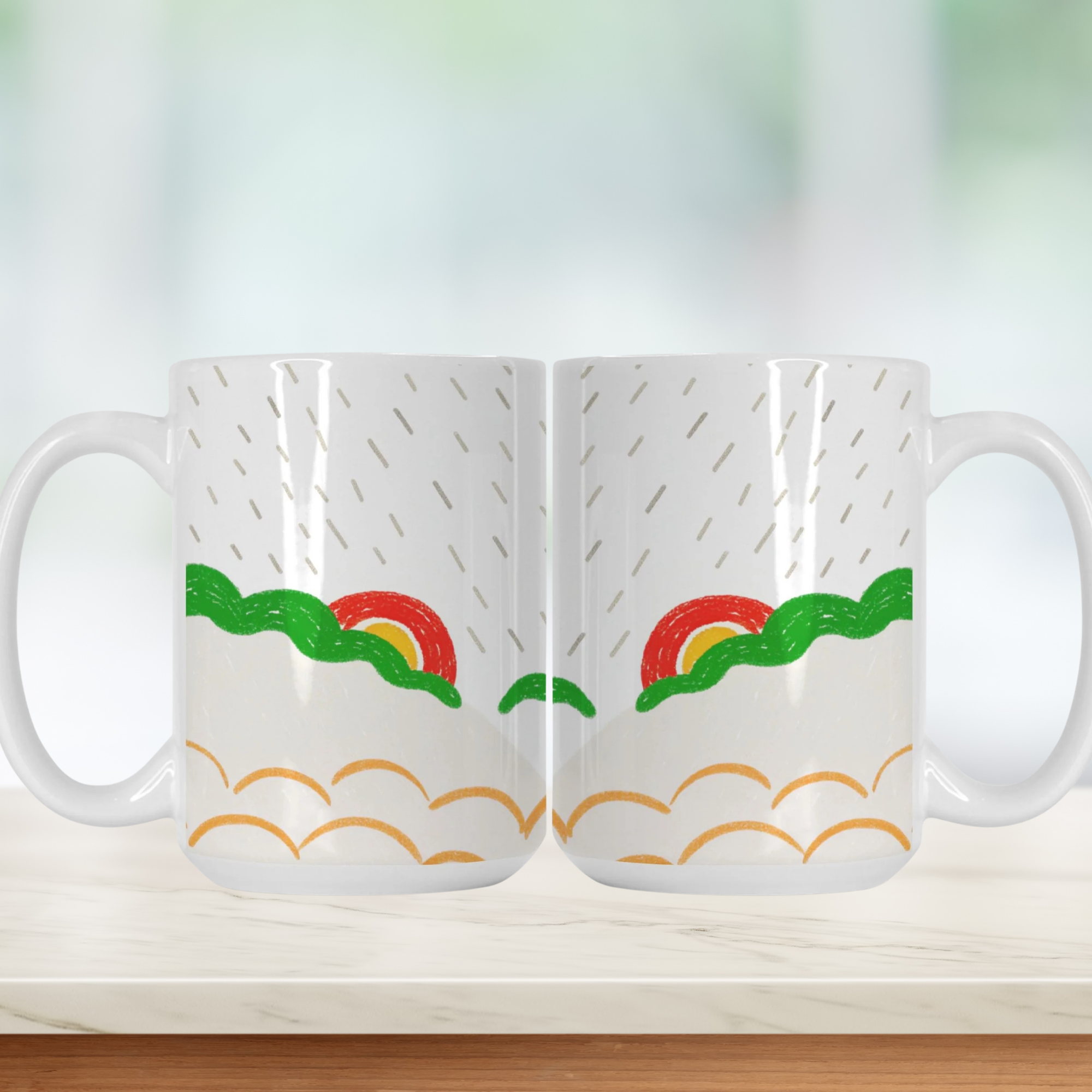 Two mugs with a colorful hand drawn design of a sun and clouds on a white background.