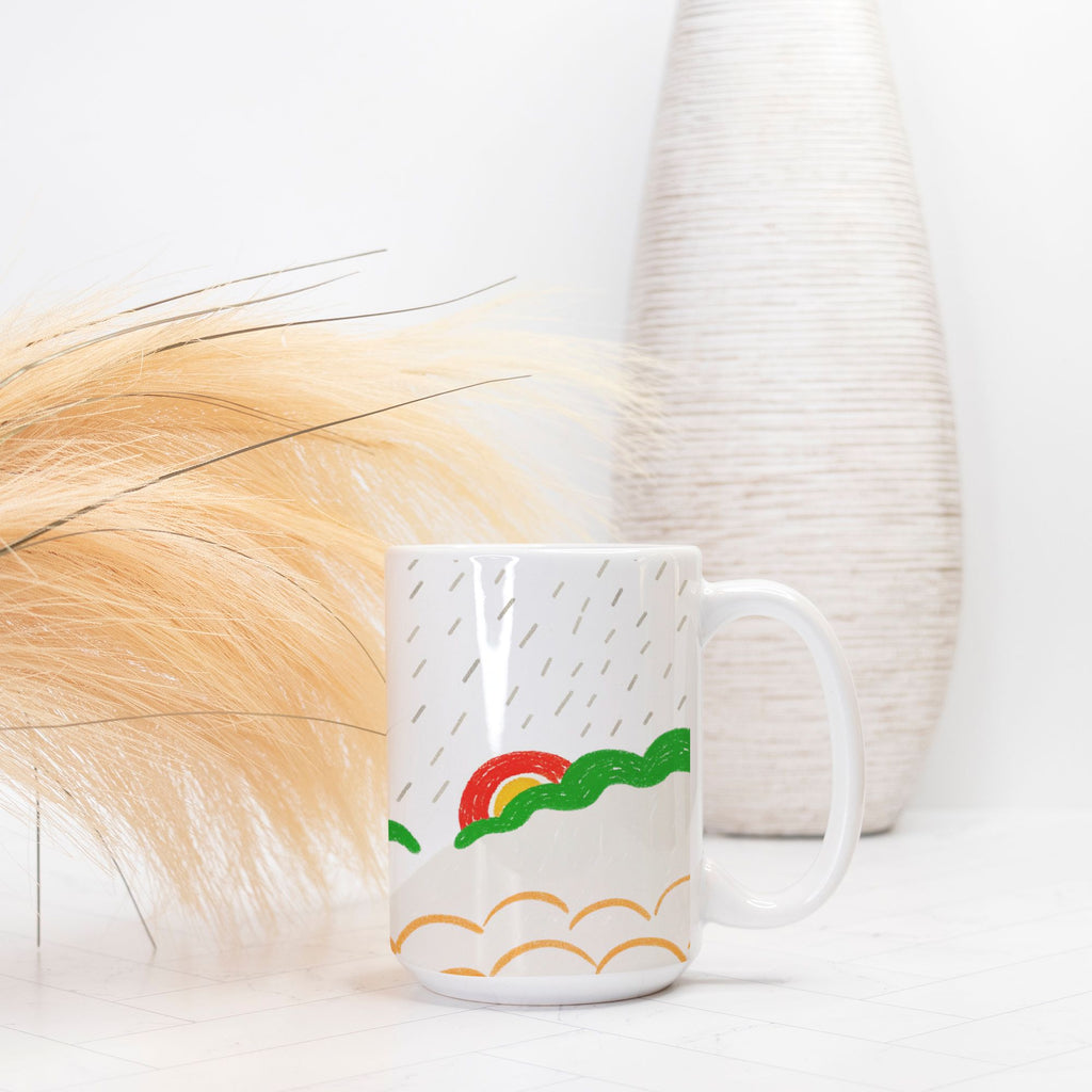 White mug with colorful design on a white surface with decorative elements