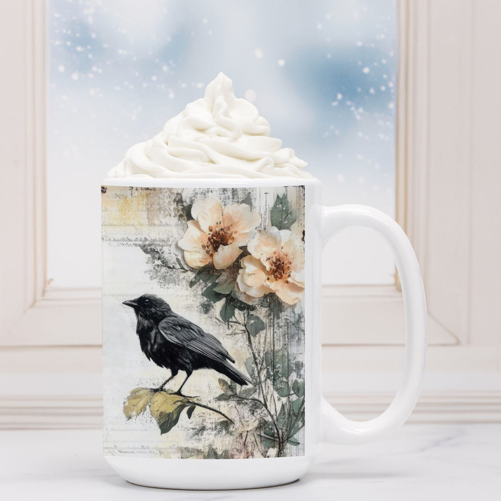 White mug with floral and bird design, filled with hot chocolate and whipped cream.