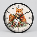 A round wall clock with a black frame and a printed illustration of a fox wearing a red-and-green striped scarf, seated among holly leaves, pinecones, and red berries on an off-white face with black Roman numerals.