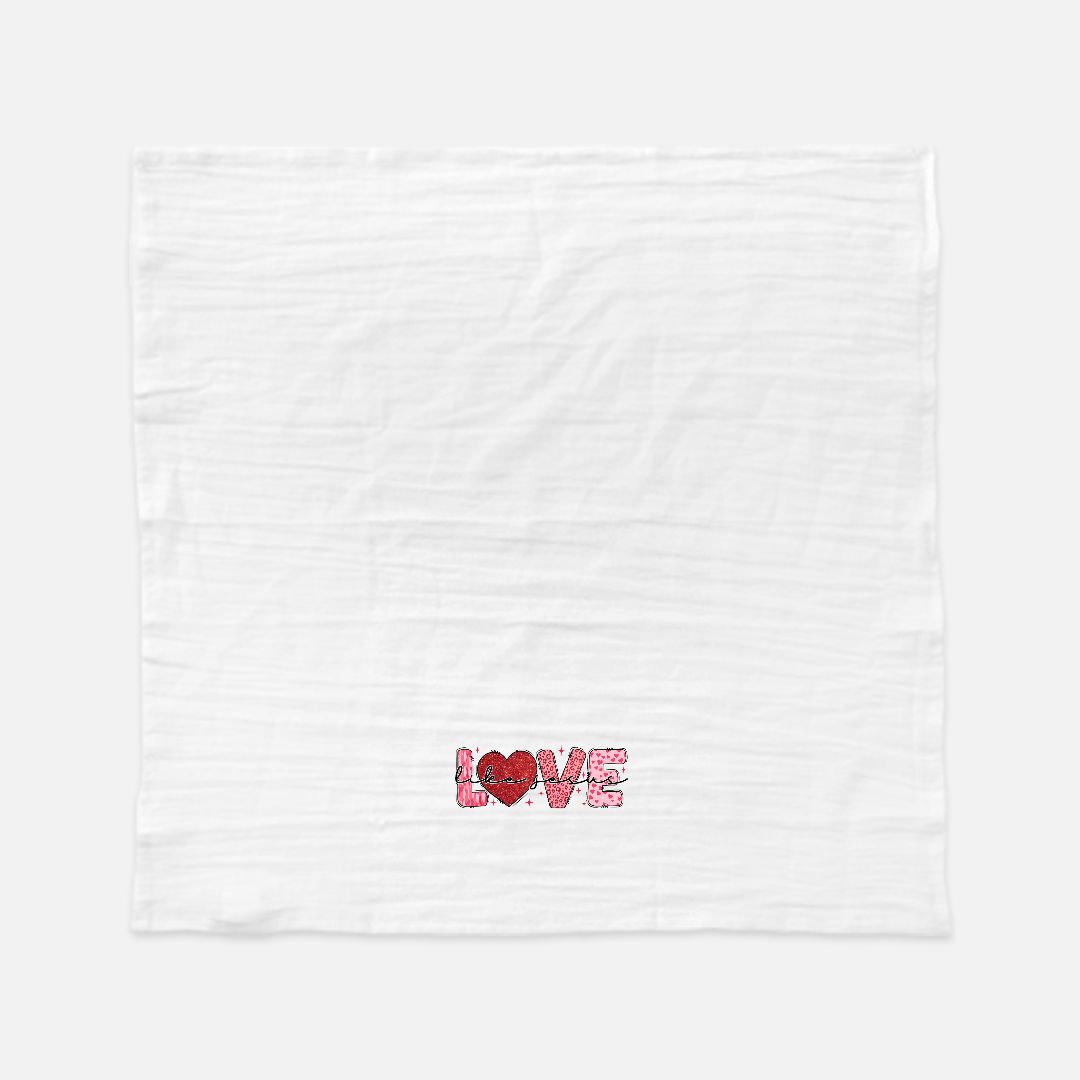 White tea towel with 'LOVE Like Jesus' printed on it featuring a red heart Valentines style design.