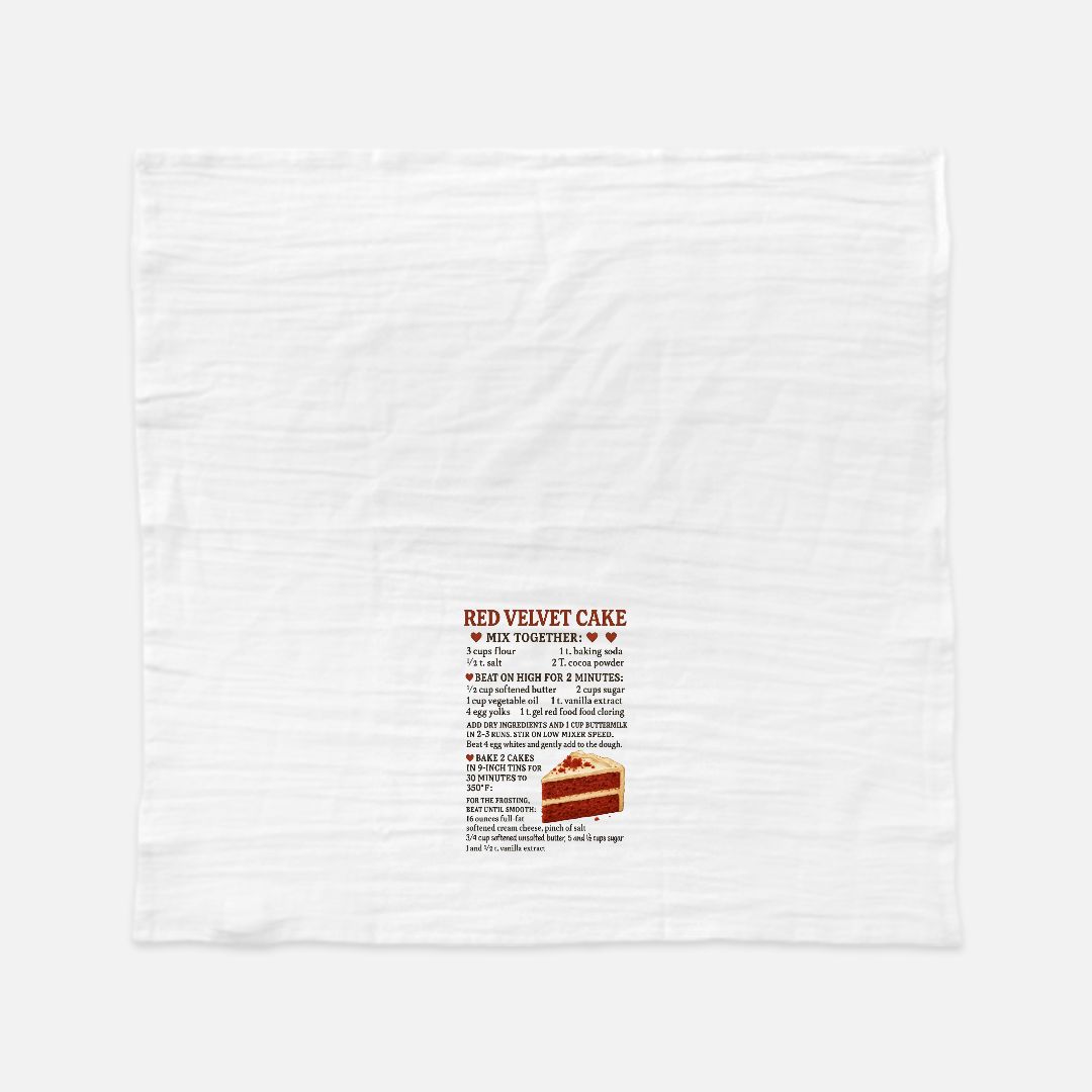 White towel with red velvet cake recipe printed on a white background