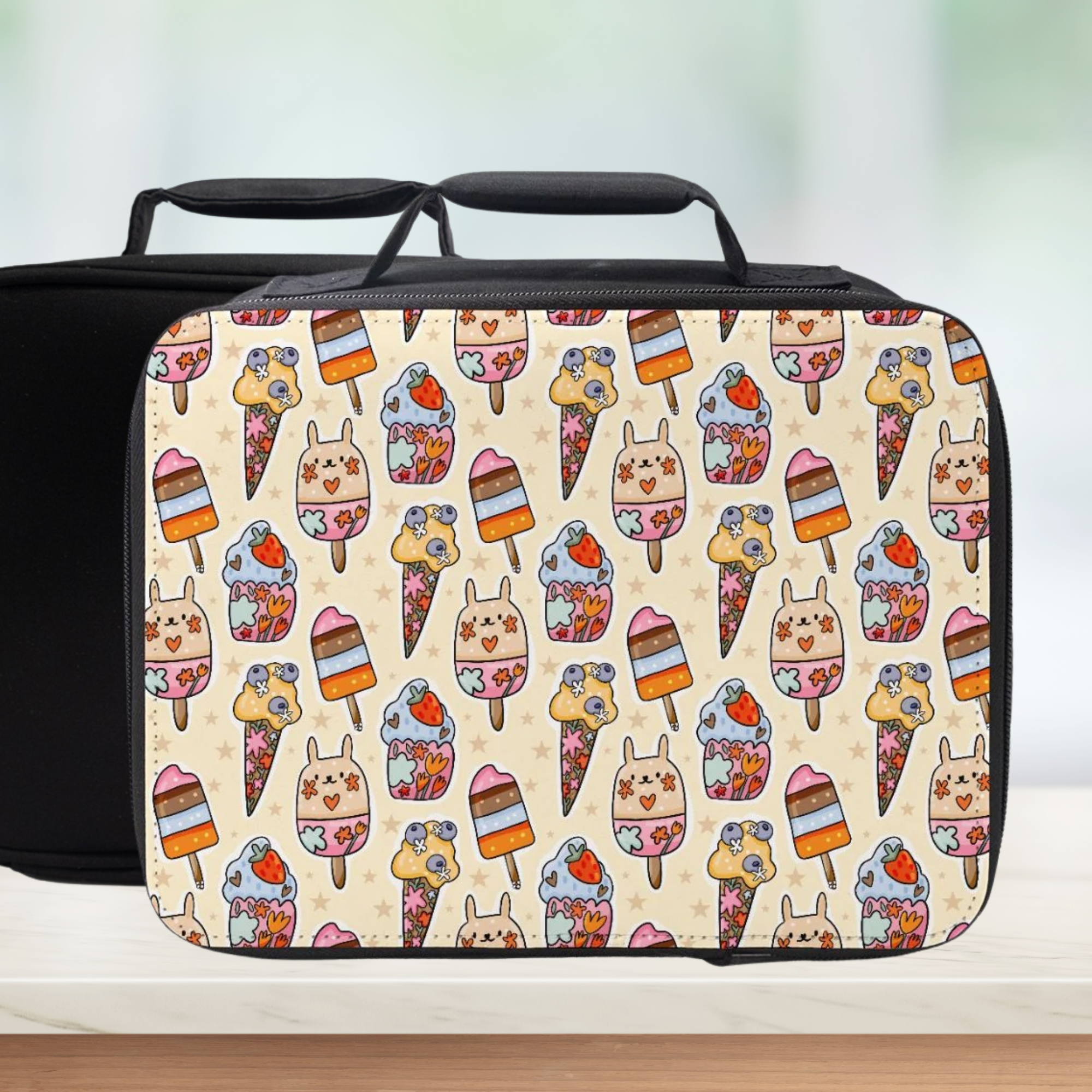 Insulated lunch bag with a colorful ice cream pattern on a beige background