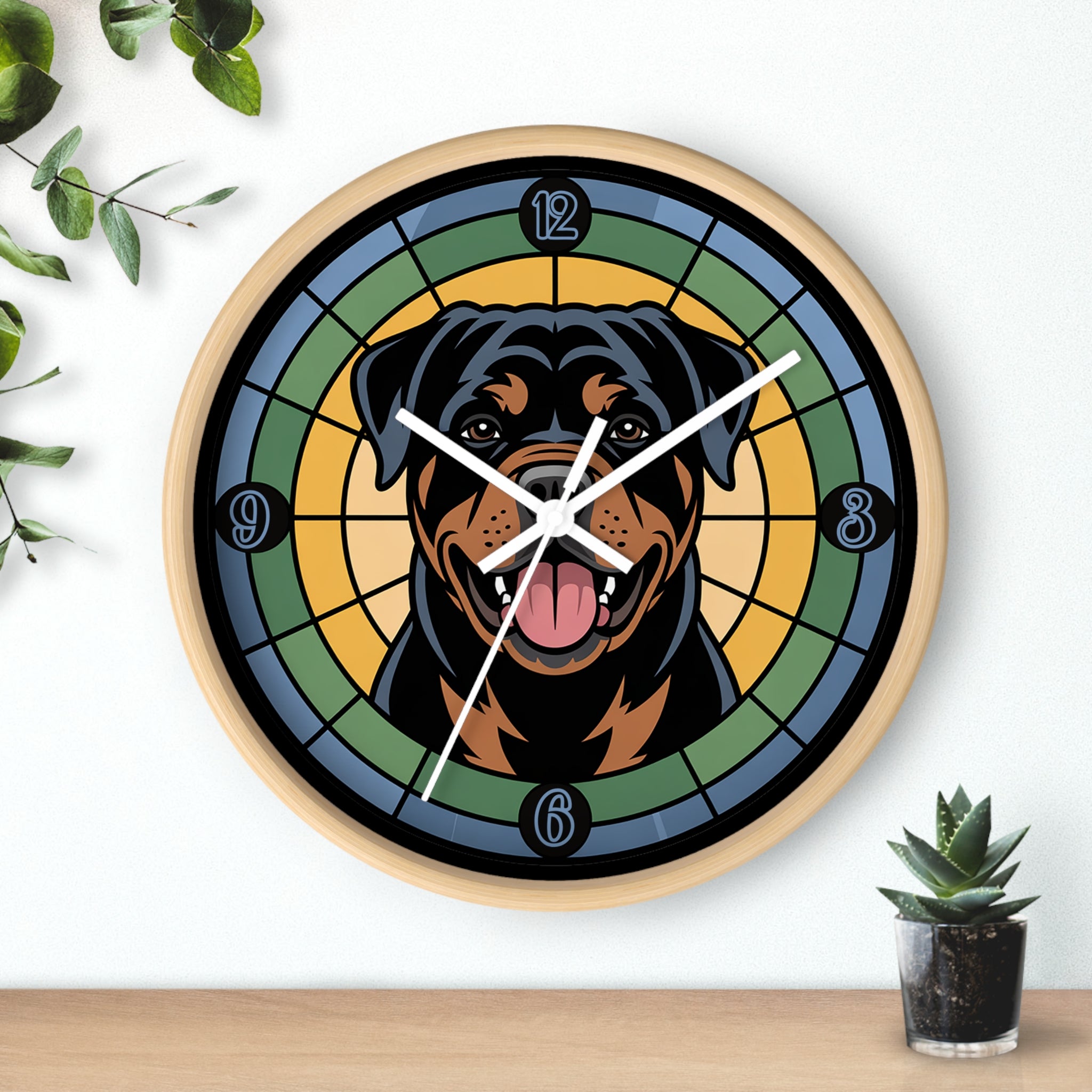 Natural wood wall clock with a Rottweiler design on a white wall with a plant and small pot.