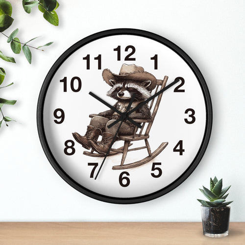 Round black wall clock with a raccoon in a cowboy hat design on a white background