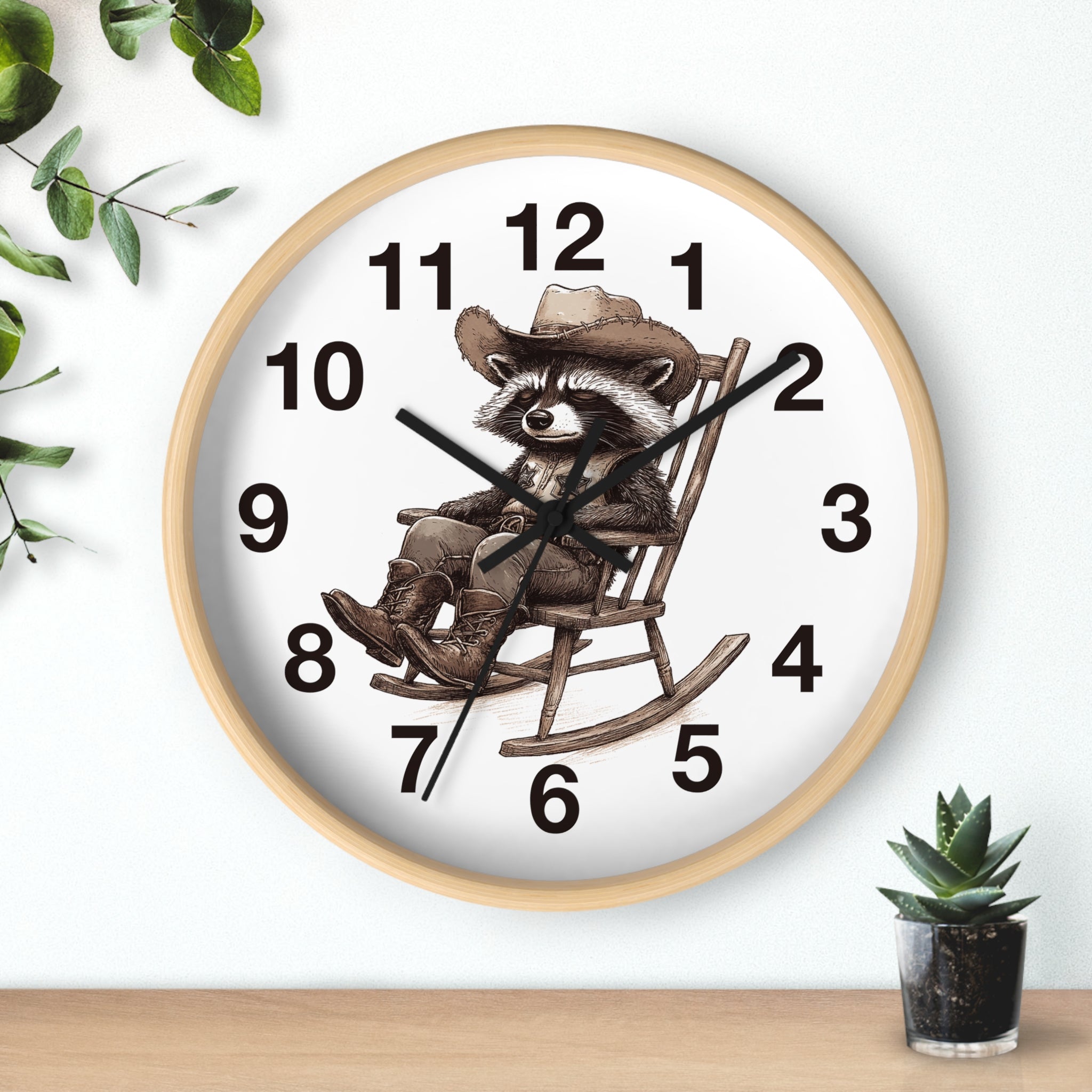 Round wood wall clock with a raccoon in a hat and boots sitting in a rocking chair design on a white background
