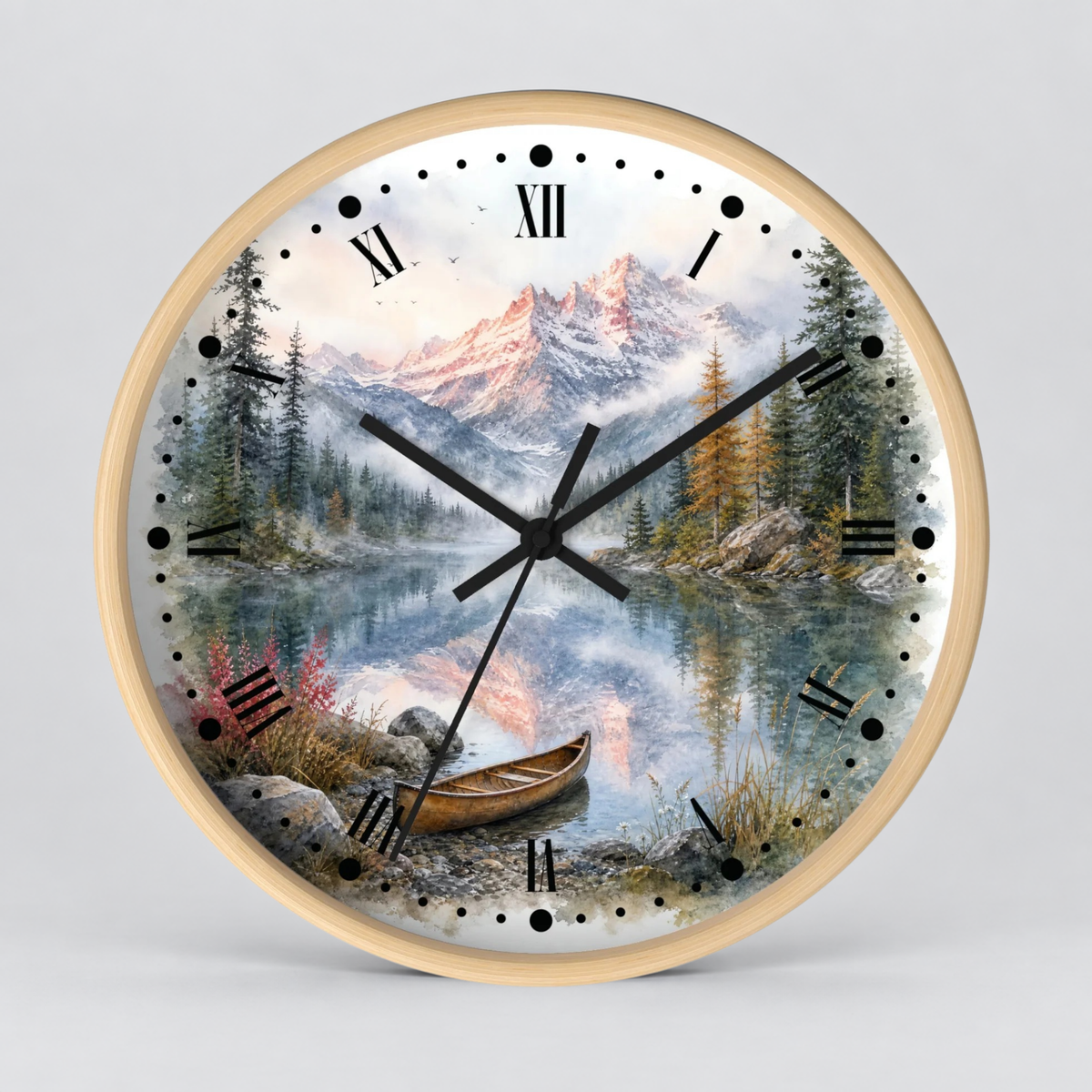 A round wall clock with a light wood frame and a scenic landscape print on the face, featuring mountains, a lake, trees, a small boat, and black Roman numerals with black hands on a light gray background.