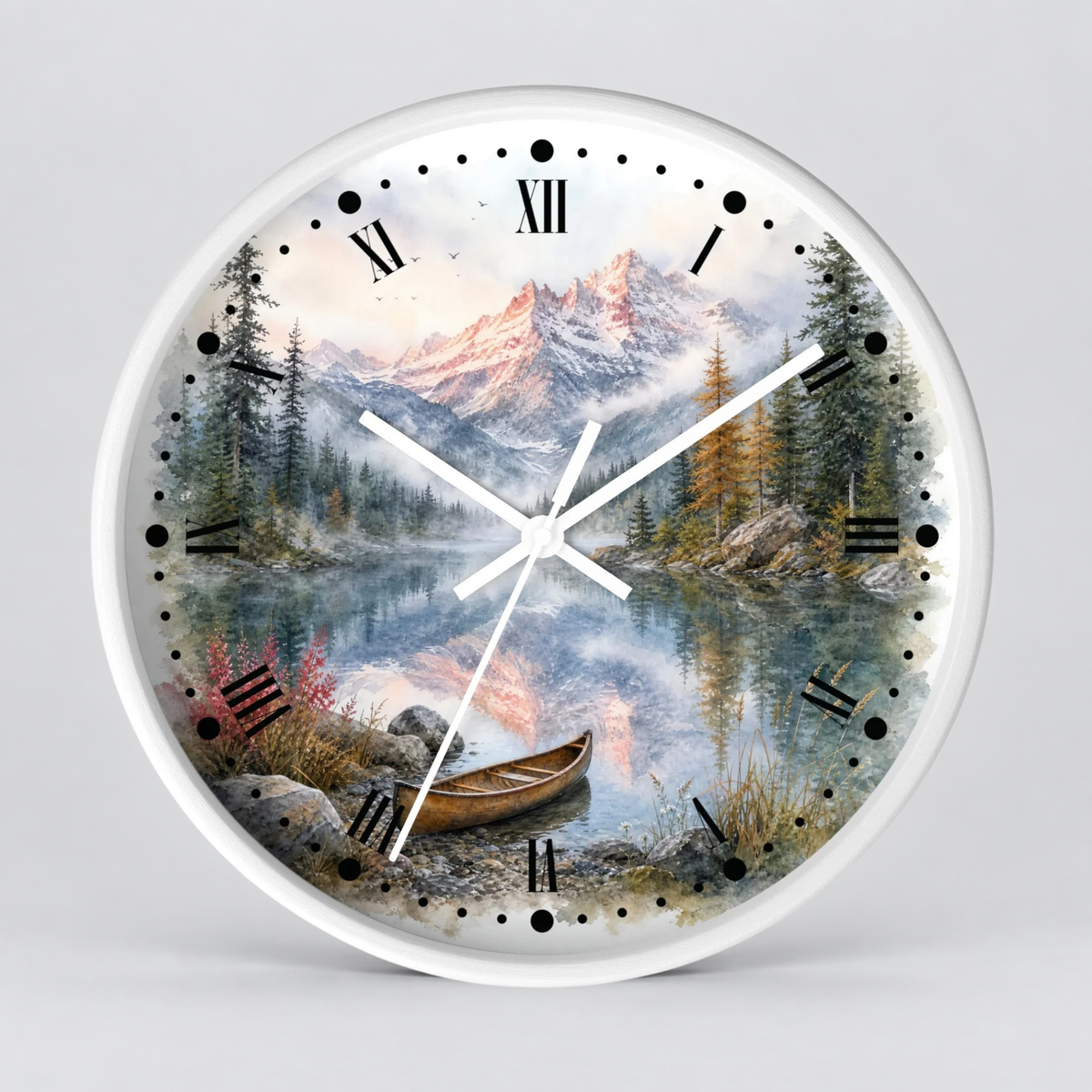 Round wall clock with a white frame and a scenic nature print on the face, featuring a mountain landscape, pine trees, a calm lake, and a small boat. Roman numerals mark the hours, with white clock hands and black hour markers.