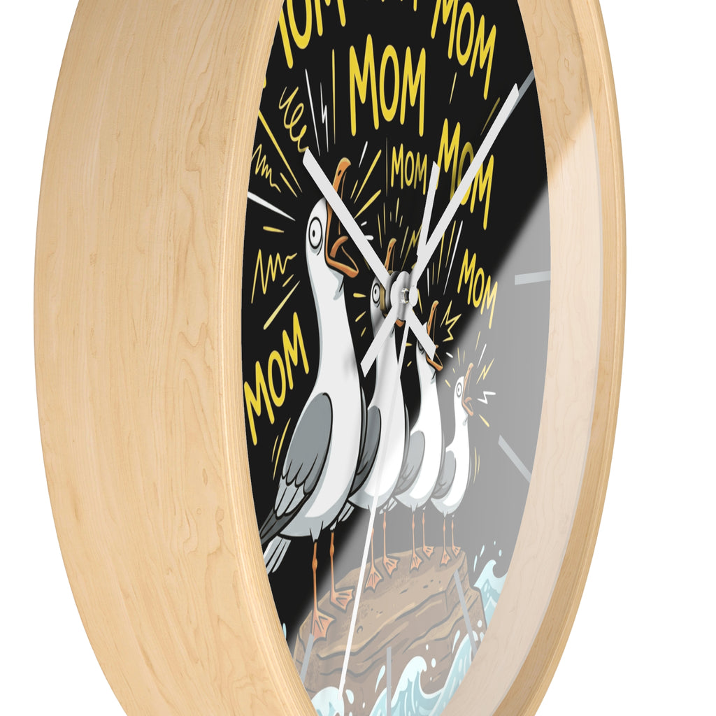 Side view of a round wood wall clock with white hands and a design of a seagull bird and 'MoM' text on a black background