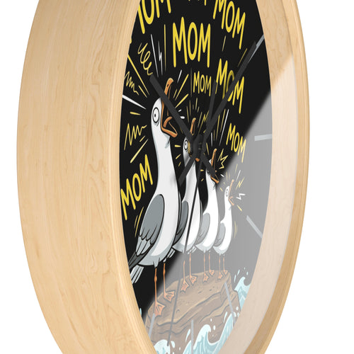 Side view of a wood wall  clock with seagull bird design and 'MOM' text on a black background