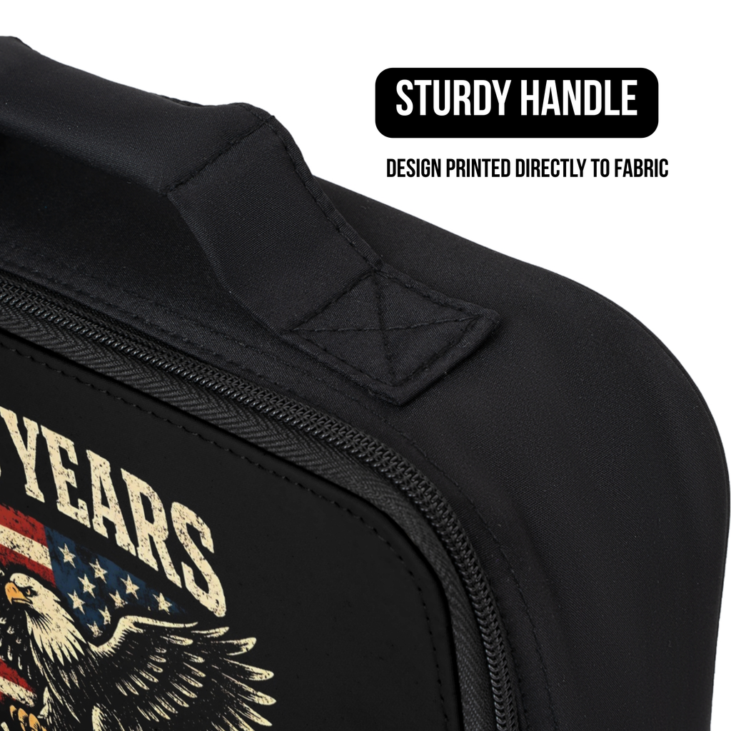 Black lunch bag with eagle design and text, sturdy handle feature highlighted.