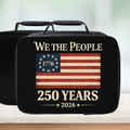 Black lunch box with American flag and 'We the People 250 Years' text on a blurred background