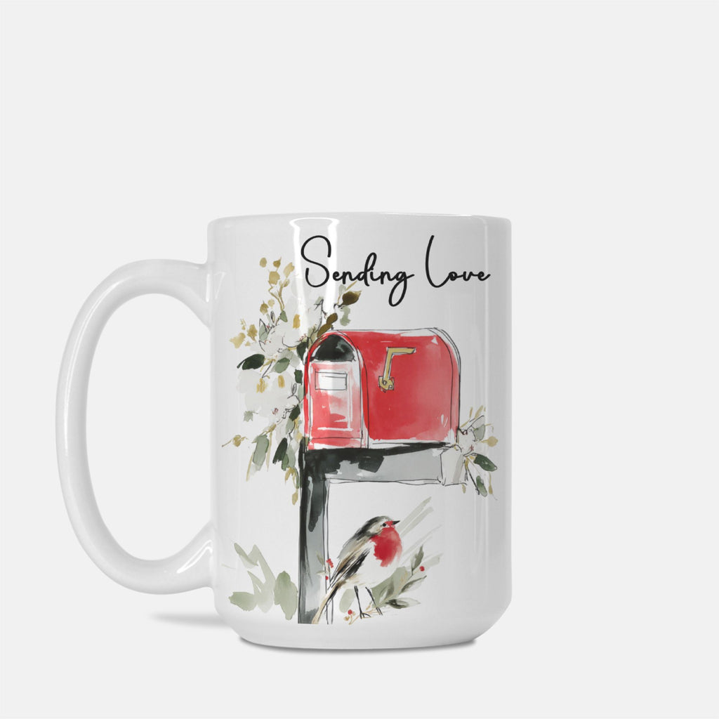 Mug with a design of a red mailbox, bird, and floral elements on a white background.